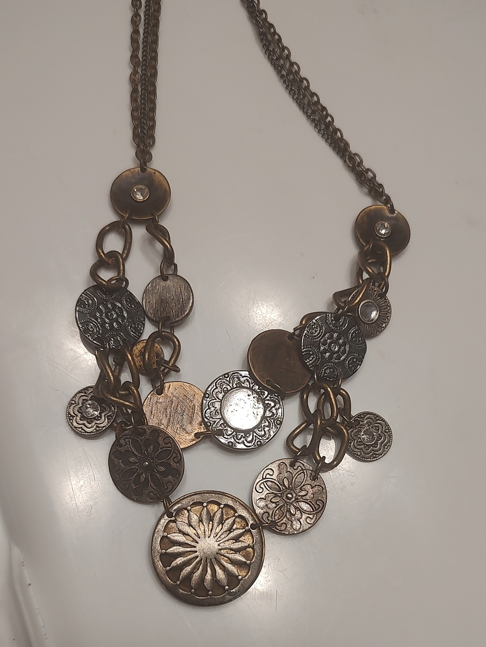 multi-strand mixed-metal charm necklace antiqued finish